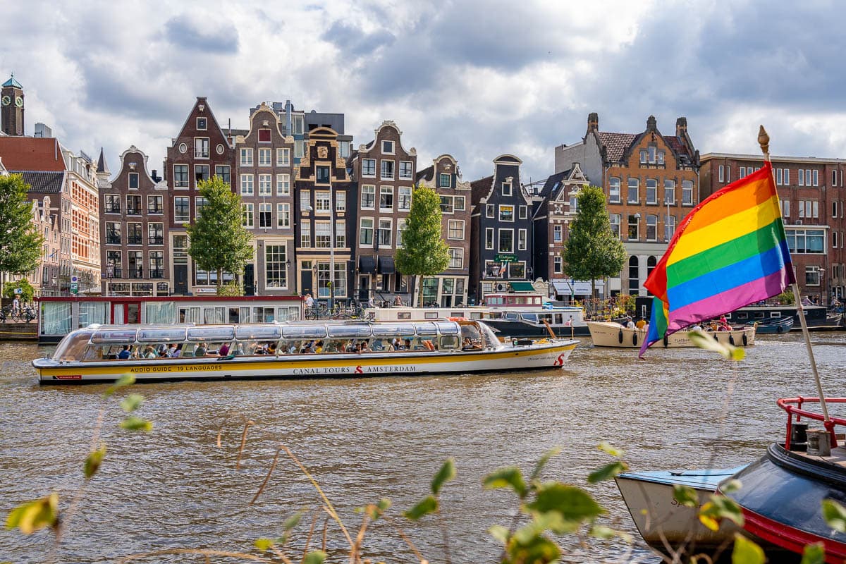 Amsterdam canal scene with cruise boats